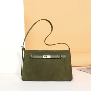 Green suede shoulder bag for women, elegant large capacity tote bag with metal lock closure.