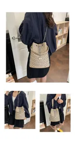 Chic lychee pattern rivet bucket bag with pearls and chain strap for women fashion style.