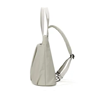 Lightweight waterproof nylon convertible backpack and tote bag side view detail display.