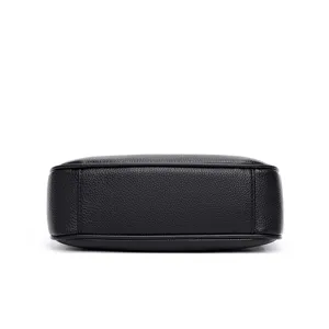 Detailed bottom view of a black leather crossbody shoulder bag with clean texture design.