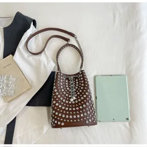 Brown leather bucket bag with dazzling rhinestones and chain strap, stylish everyday purse.