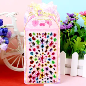 Detailed view of colorful crystal gemstone stickers, self-adhesive rhinestones for phone and car decoration.