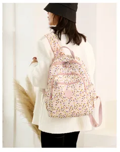 Zaino casual da donna con stampa a pois, in nylon leggero e impermeabile per viaggi e scuola.