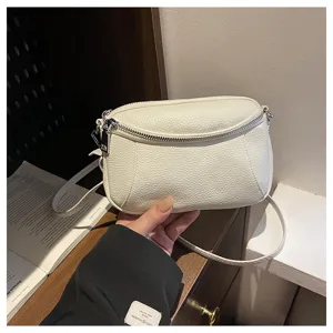 White genuine leather mini crossbody bag for women, stylish double zipper shoulder bag.