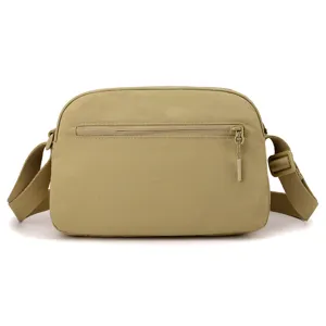 Casual khaki nylon crossbody bag for women, lightweight multi-layer daily shoulder bag.