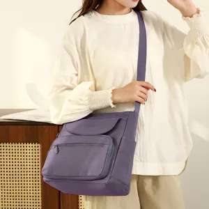 Purple casual crossbody shoulder bag for women, stylish multi-functional daily small handbag.