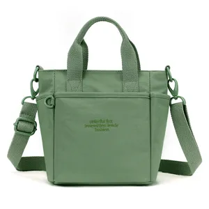 Sac bandoulière en nylon vert pour femme, cabas décontracté grande capacité.