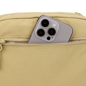 Detail shot of multi-layer casual crossbody canvas shoulder bag front zipper pocket with phone.