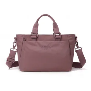Sac bandoulière décontracté en nylon pour femme, grand format, multi-poches pratique.