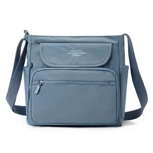 Blue nylon crossbody shoulder bag for women, multi-pocket casual daily messenger handbag main view