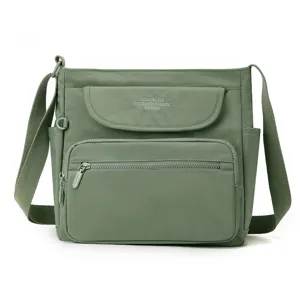 Fashion green nylon crossbody shoulder bag for women, multi-pocket casual daily handbag.