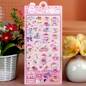 Close-up detail of 3D crystal puffy sticker sheet featuring cute bunnies and sweet cartoon icons.