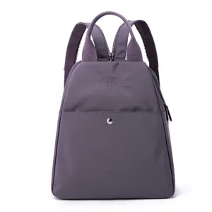 Zaino casual viola elegante da donna, borsa da viaggio leggera e multifunzionale.