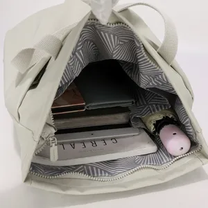 Lightweight nylon laptop tote bag with spacious interior and stylish pattern for daily use
