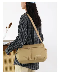 Detail shot of the casual nylon crossbody bag showcasing its durable texture and strap.