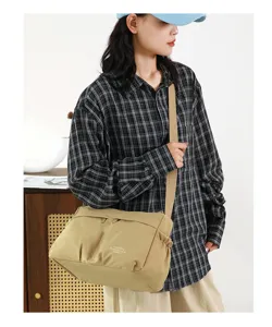 Detailed view of the casual nylon crossbody shoulder bag, lightweight and durable for daily commute.