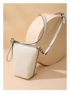 Detailed view of the chic white minimalist crossbody shoulder bag featuring zipper.