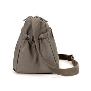 Detailed view of the women casual nylon crossbody shoulder bag, highlighting fabric texture and zippers.