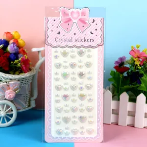Close-up detail of colorful acrylic heart diamond stickers for DIY crafts and decoration.