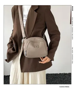 Lightweight nylon crossbody bag casual versatile shell shoulder bag for daily commuting.