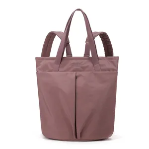 Waterproof nylon convertible backpack tote bag for laptop, stylish casual shoulder daypack.