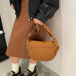 Detailed view of women casual nylon crossbody bag with multi-pocket design and large capacity.