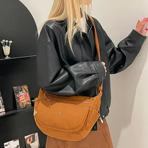 Casual nylon crossbody bag for women, lightweight multi-compartment daily shoulder bag.