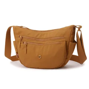 Nylon crossbody bag for women, casual lightweight multi-pocket shoulder bag brown.