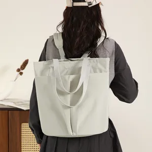 Lightweight nylon laptop tote backpack, casual convertible shoulder work bag for women.