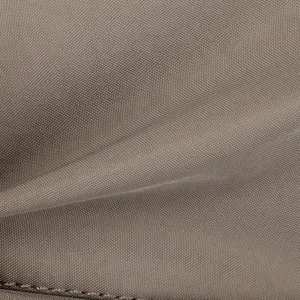 Detailed close-up view of the premium waterproof nylon fabric texture and stitching.