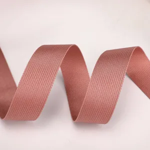 Detailed view of the durable nylon shoulder bag strap, textured webbing design.