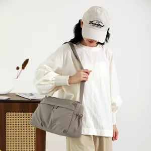 Stylish women's nylon shoulder bag, casual crossbody design, perfect for daily commute and travel.