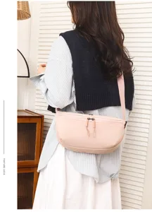 Casual lightweight nylon crossbody saddle bag, waterproof everyday shoulder bag style.