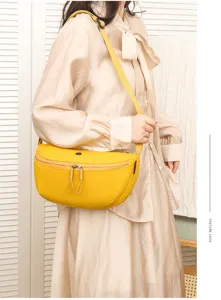 Casual yellow nylon cross-body saddle bag for daily wear, lightweight and practical.