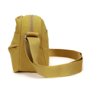 Water-resistant nylon crossbody bag side detail view, casual women shoulder bag.