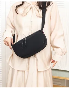 Unisex waterproof nylon crossbody bag casual lightweight crescent shoulder sling bag.