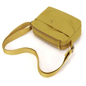 Waterproof nylon crossbody bag for women, casual multi-pocket shoulder bag with wide strap.