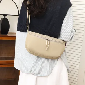 Minimalist waterproof nylon crossbody saddle bag, lightweight casual daily shoulder bag detail.