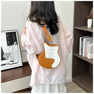 Unique guitar shaped crossbody bag for women, chic color block shoulder bag with cool rivets.