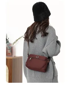 Casual women nylon crossbody shoulder bag, lightweight water-resistant daily purse, dark red.