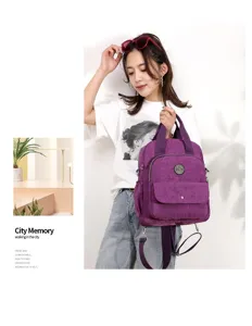 Mochila de nylon elegante para mujer bolso casual de viaje ordenador morado moda diario bien