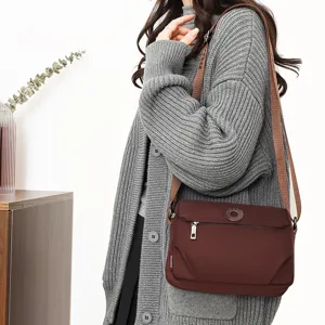 Detailed view of casual women's nylon crossbody bag, lightweight daily shoulder purse.