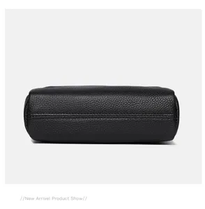 Black genuine leather women shoulder bag bottom detail, premium craftsmanship and durability.