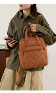 Stylish nylon backpack for women with quilted design, versatile shoulder and handbag style.
