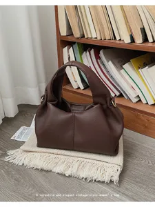 Vintage dark brown leather hobo bag, versatile pleated cloud shoulder bag for women daily commute.