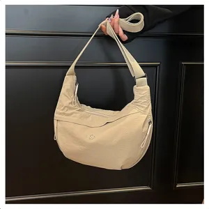 Lightweight nylon hobo crossbody shoulder bag, casual waterproof casual design for daily use.