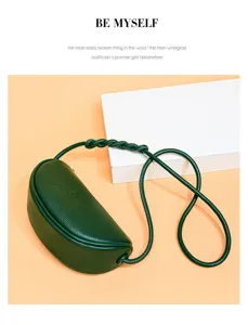 Dark green genuine leather half-moon crossbody bag with stylish twisted rope shoulder strap.