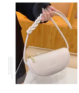 Genuine leather women's crescent shoulder bag, minimalist crossbody purse for daily fashion.