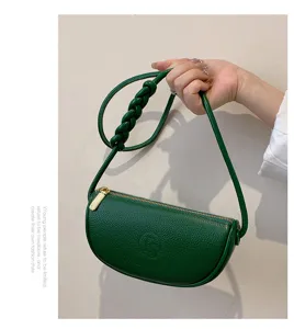 Green genuine leather crescent shoulder bag with braided handle for women stylish casual use