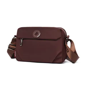 Casual women's nylon crossbody shoulder bag, lightweight waterproof everyday small square bag.